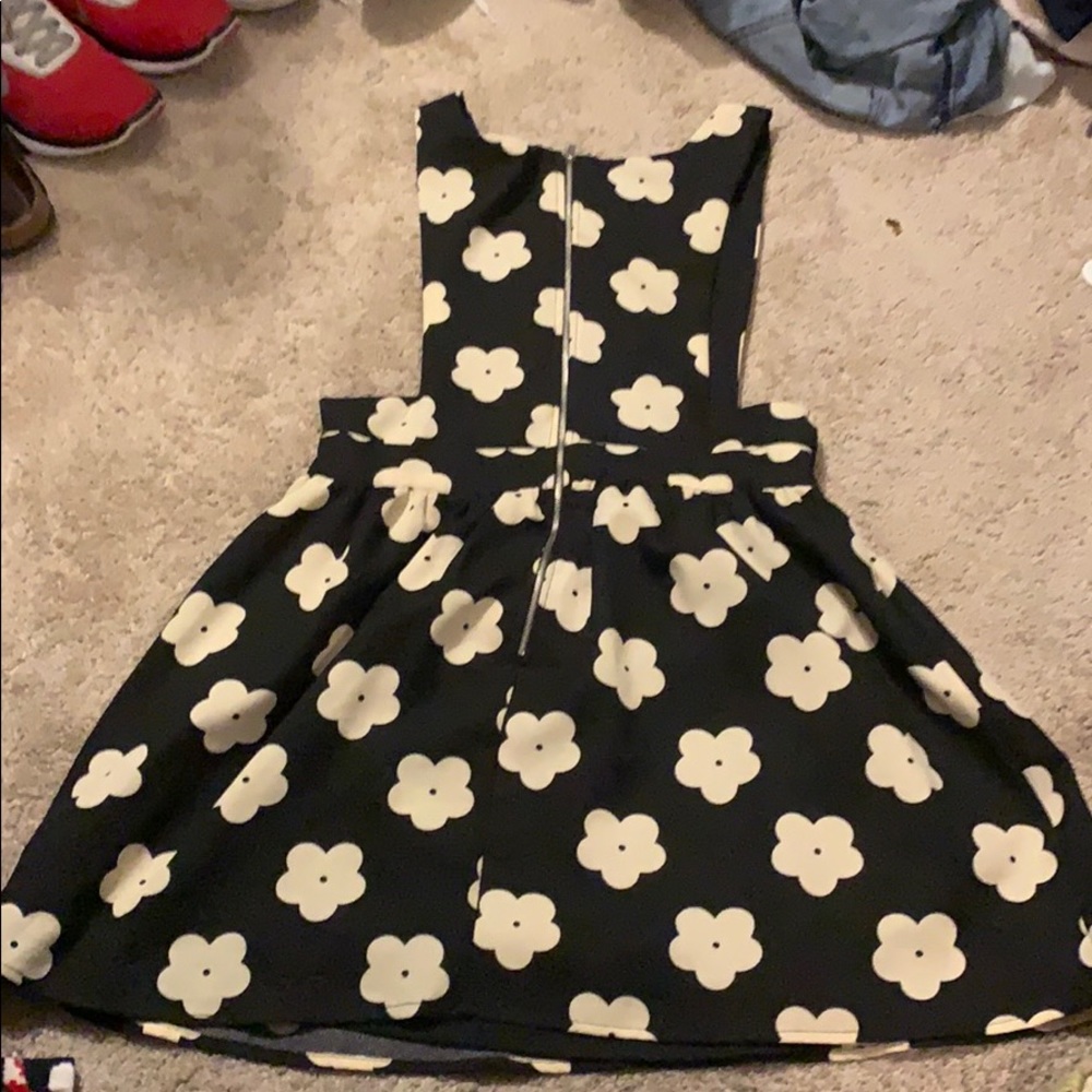 Black overall dress with white flowers